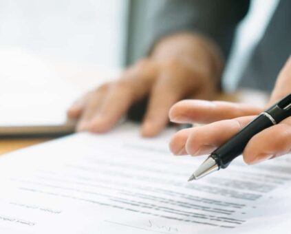 Person signing contract