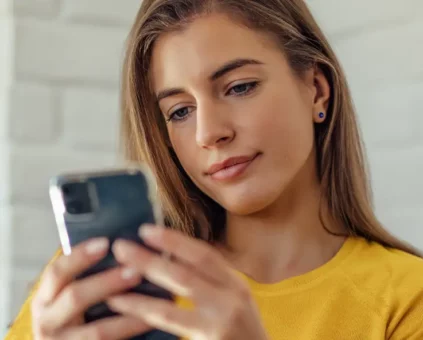 Young Female looking at smartphone