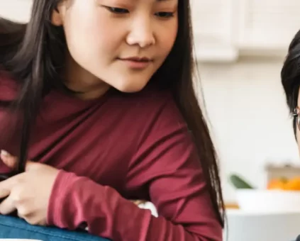 Young couple looking at laptop