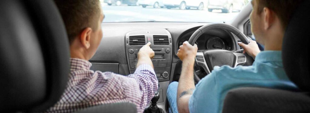 Two men driving in a car