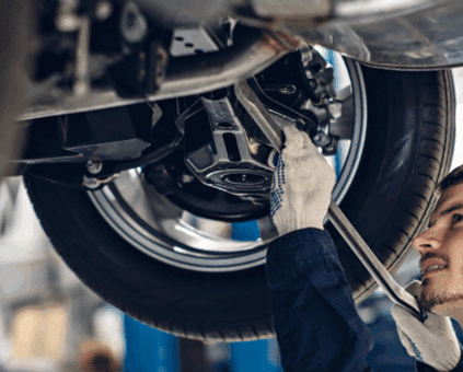 mechanic working on a vehicle