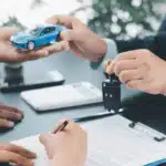 loan approval scene with documents and keys, illustrating bad credit car car loans