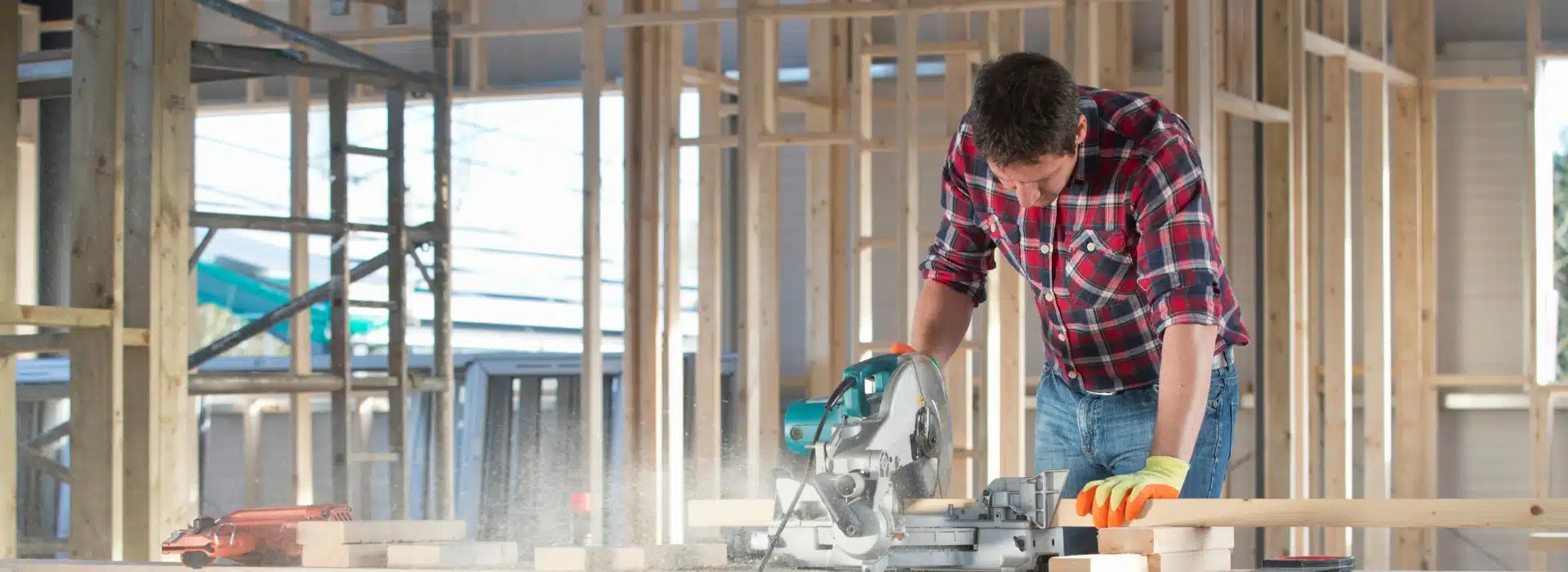 Hardworking tradesperson on-site representing support for bad credit and low‑doc car loan customers.