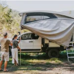 Family camping in their new vehicle in Australia