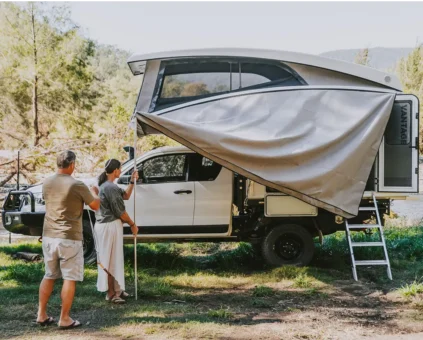 Family camping in their new vehicle in Australia