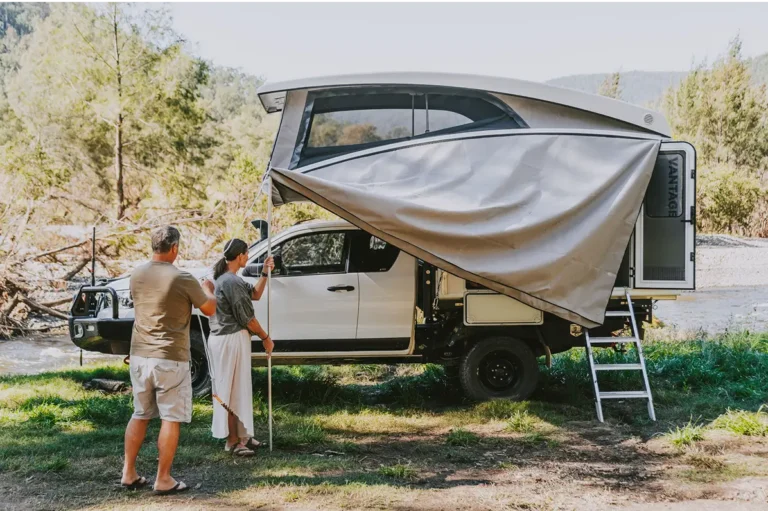 Family camping in their new vehicle in Australia